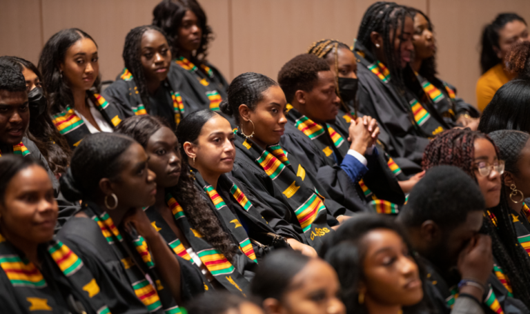 An image of graduates seated at the Black Graduation Celebration
