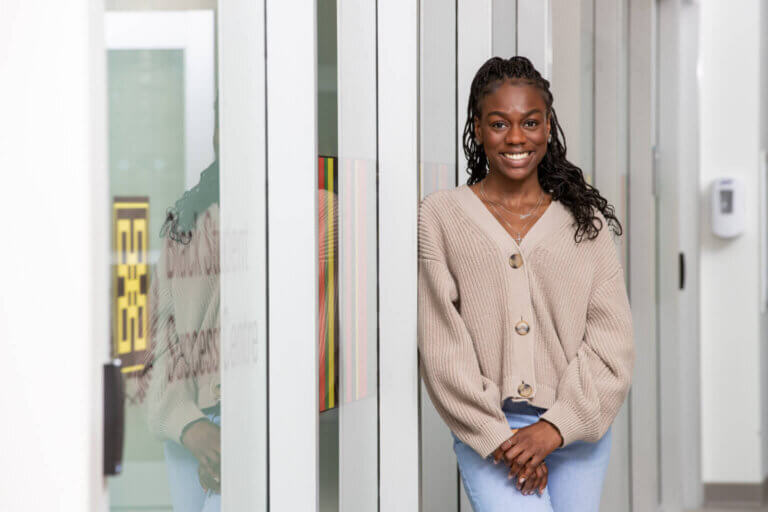 A portrait of a smiling Black student