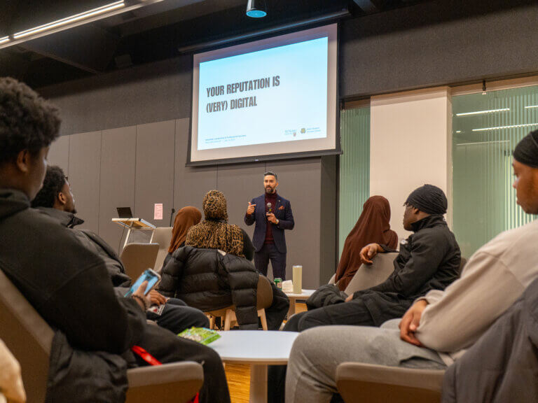 Man giving a presentation titled 