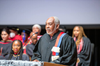 An image of Dr. Gary Warner giving a speech at the Black Graduation Celebration 2022