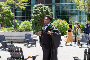 An image of graduate outside at the Black Graduation Celebration.